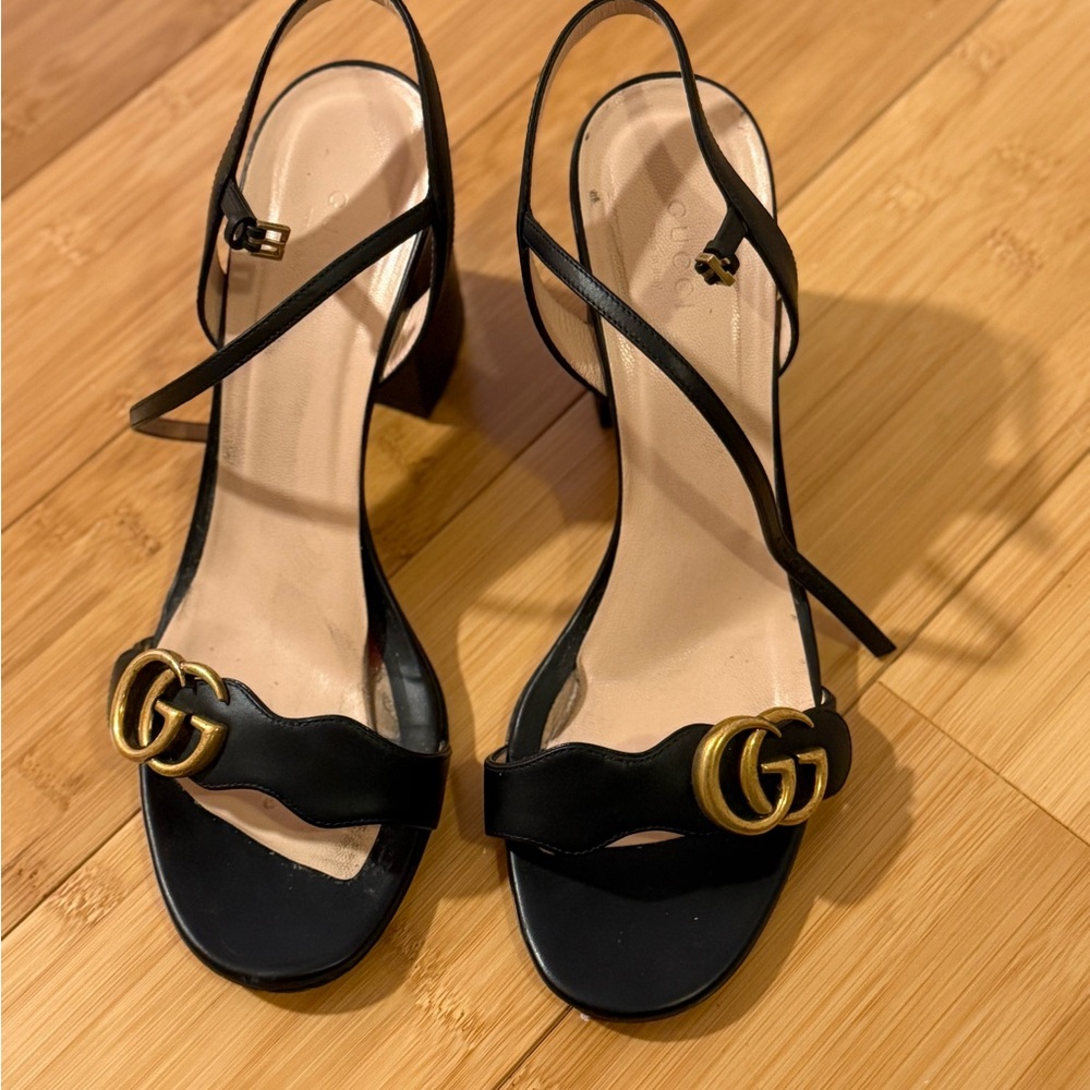 Gucci Black Heels with Gold Logo Accent